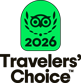 A green badge with an owl face, laurel leaves, and the year "2026" above the words "Travelers' Choice.